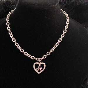 Silver necklace with a heart and the letter A with zircons